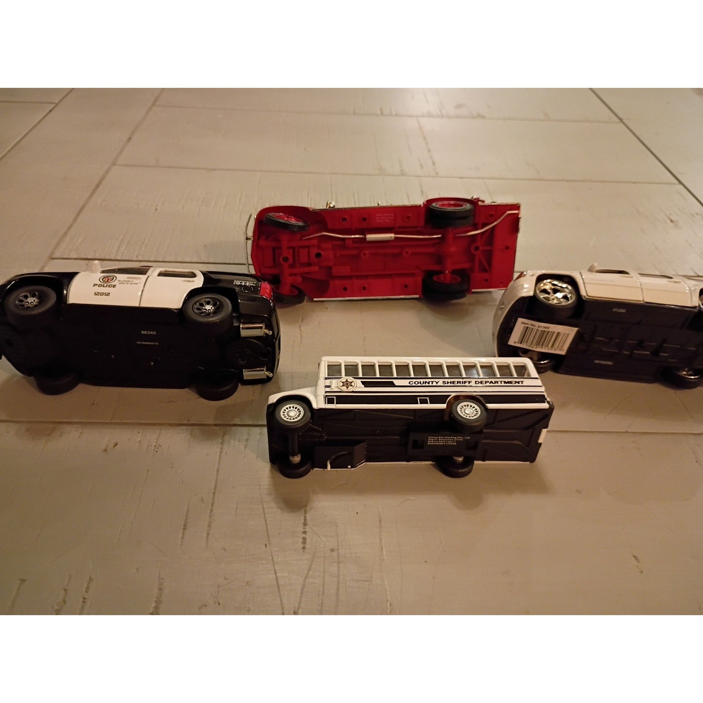 Lot of 4 Diecast Vehicles Police, Fire, Sheriffs Bus, Escalade Chase Vehicle