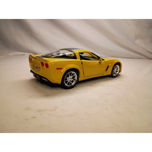 MAISTO 2009 CORVETTE Z06 1:24 Scale Diecast Model YELLOW/BLACK