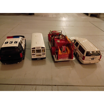 Lot of 4 Diecast Vehicles Police, Fire, Sheriffs Bus, Escalade Chase Vehicle