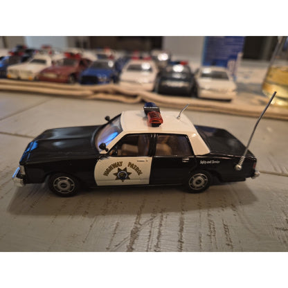 Diecast 1:43 1988 Chevrolet Caprice CHP Crusier by White Rose Collectibles Loose