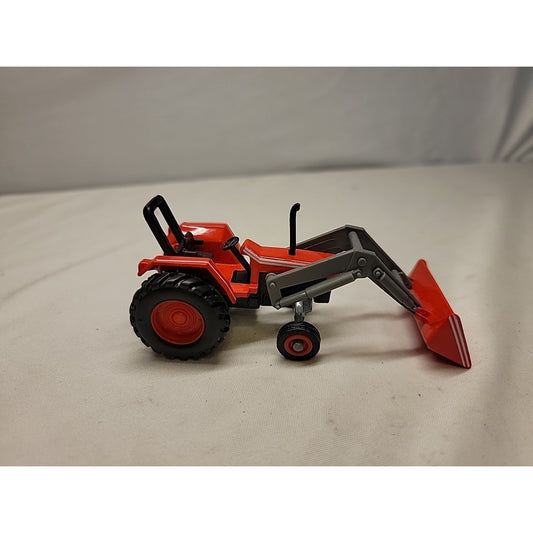 Tractor with front bucket