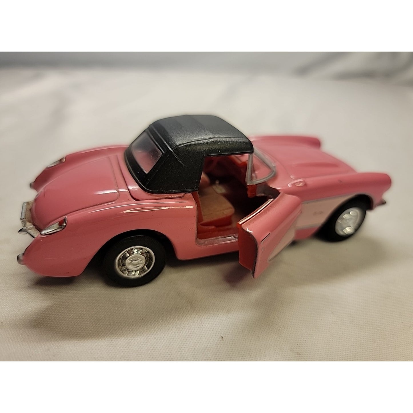 1957 Pink & White Corvette Die-Cast Toy Car Scale 1.32 By WELLY