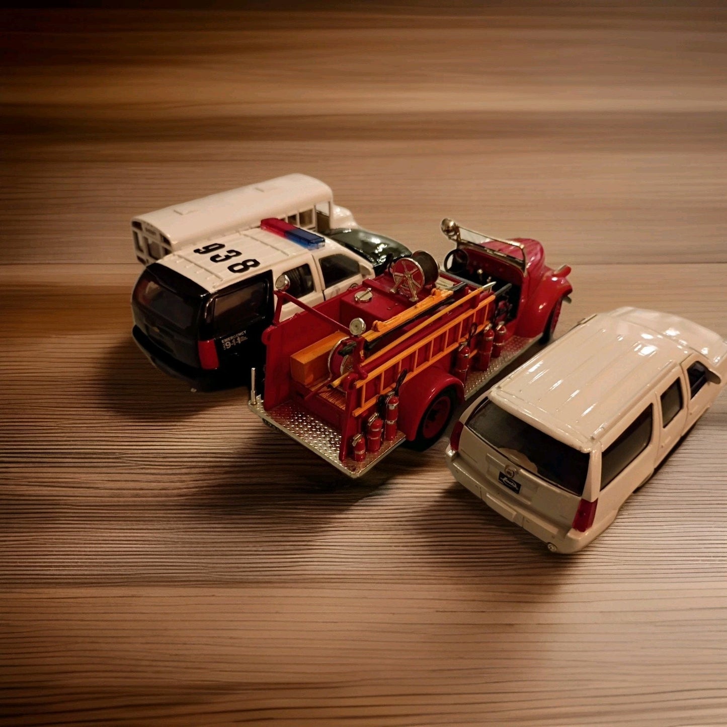 Lot of 4 Diecast Vehicles Police, Fire, Sheriffs Bus, Escalade Chase Vehicle