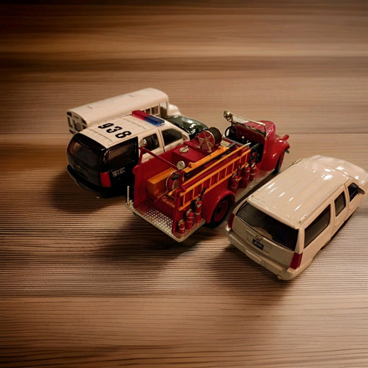 Lot of 4 Diecast Vehicles Police, Fire, Sheriffs Bus, Escalade Chase Vehicle